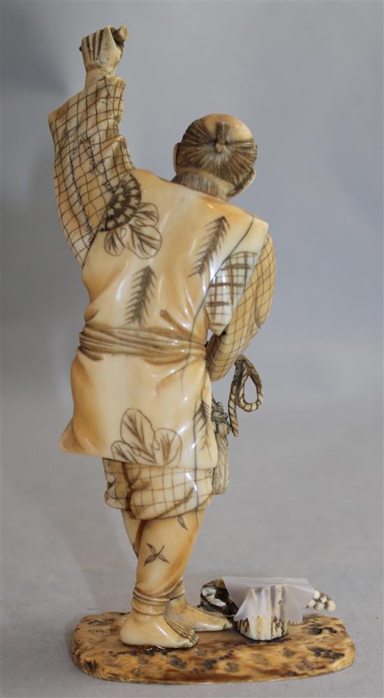 Japanese Meiji period ivory okimono of a grape picker, Meiji period, 17.2cm, faults(-)